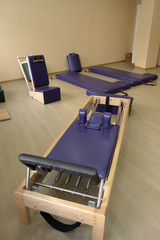 Reformer pilates studio machine for fitness workouts in gym. - 262744648
