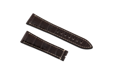Dark brown, leather watchband white stitched at the edges, isolated on white background.