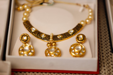 Gold jewelry in box , Necklace