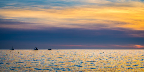 Fototapeta na wymiar Beautiful Atlantic coastal shoreline scenery of lighthouses and lobster boats.