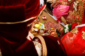 Indian wedding  photography ,groom and bride hands