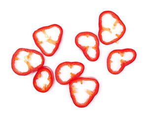 Fresh red paprika slices isolated on white background, top view