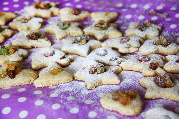 Oatmeal cookies, dietary of different shapes, with raisins and dried apricots. Baking, baking concept. Proper nutrition concept.