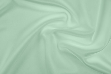 Green satin fabric texture for background