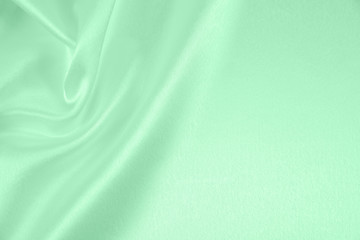 Green satin fabric texture for background