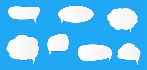 White blank retro speech bubbles set on blue background. Vector Illustration