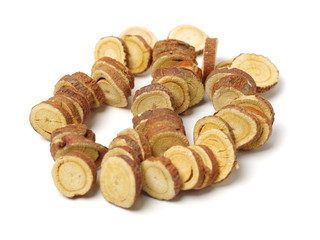 Licorice roots on white background