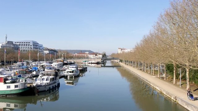 View on the marina of Nancy, on the Moselle river. Blue sky, sunny day. Nancy is a city located in north east France. Panorama.