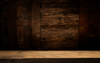 background barrel and worn old table of wood