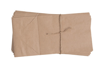 A stack of paper bags on a white background. Isolated