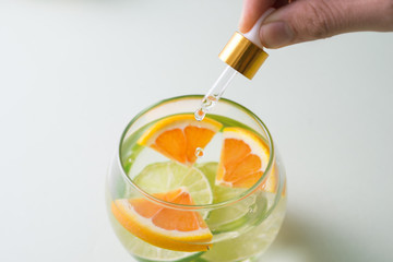 Essential oil with orange - vitamin C. Natural remedies, drop vitamin C - dropper.