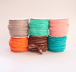 reels with colorful decorative textile ribbons for packing bouquets and gifts. floristics,...