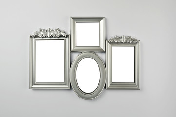 Blank picture frames hanging on wall