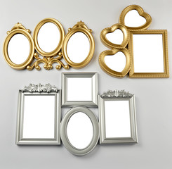 Blank picture frames hanging on wall