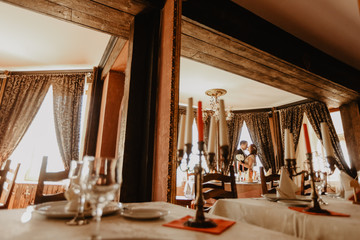 Beautiful wedding couple posing inside of castle