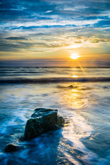Beautiful Atlantic coastal shoreline scenery of lighthouses and lobster boats.