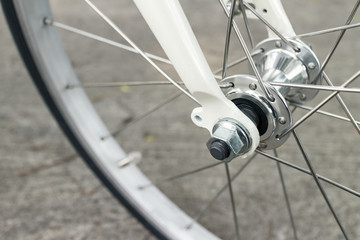 detail of vintage bicycle wheel, shallow depth of field