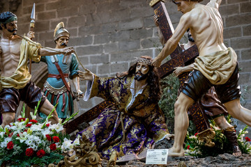 Fototapeta na wymiar Avila, Spain - April 17, 2019. the crucifixion, religious images of the Holy Week footsteps inside the Cathedral of Ávila, Spain