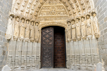 entrance with stone arch with reliefs, The Cathedral of Christ the Savior is a temple of catholic...
