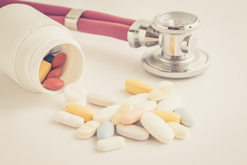 STETHOSCOPE AND PILLS CONCEPT