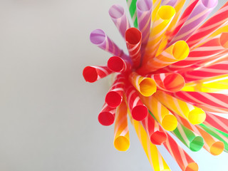 Colorful cocktail tubules on white background