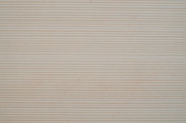 Obraz premium Ecru ceramic tile with horizontal lines on wall