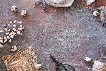 Flat lay with copy-space  on grey textured wooden surface with spring decorations