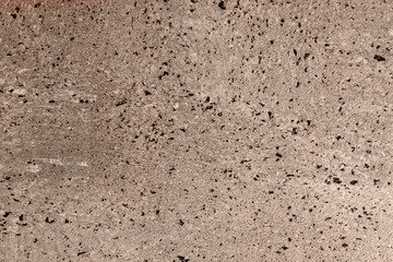 orange spotted scratched paint on the desk texture - fantastic abstract photo background