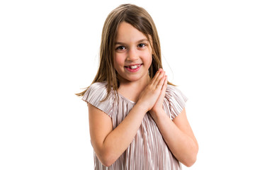 Portrait of happy young little girl with emotions on white.