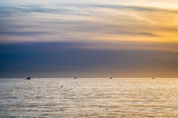 Beautiful Atlantic coastal shoreline scenery of lighthouses and lobster boats.