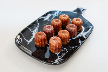 Canele is a small French pastry with rum and vanilla