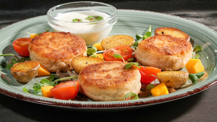 Fish patties with a side dish