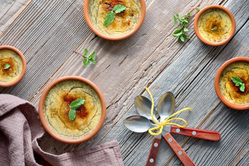 Creme brulee, or Crema Catalana, the Spanish variation of this traditional custard dessert, made in...