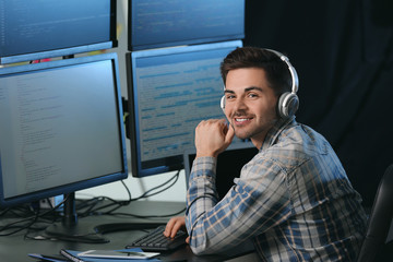 Male programmer working in office