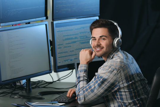 Male programmer working in office