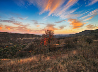 autumn sunrise. canyon of the picturesque river. beautiful autumn morning