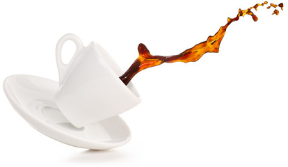 coffee splashing out of a tilted cup isolated on white - obrazy, fototapety, plakaty