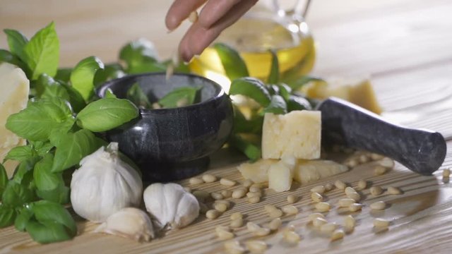 Genoise pesto sauce and ingredients on the wooden table