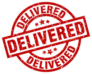 delivered round red grunge stamp