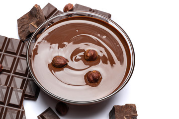 glass bowl of chocolate cream or melted chocolate isolated on white