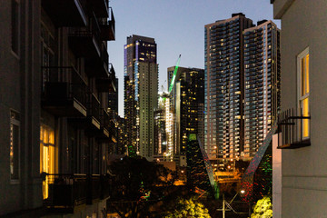 Melbourne inner city apartment view back to CBD at dusk.