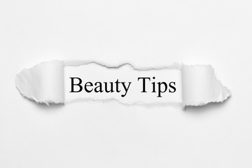 Beauty Tips on white torn paper