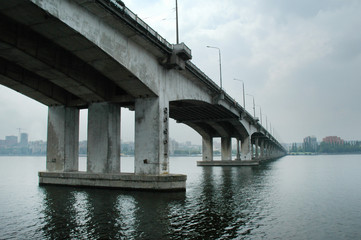 Bridge over the river Dnieper, overcast weather