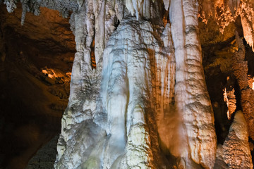 The beautiful stalactites and stalagmites and other rock formations are reflected in a small lake in the Antro del Monte Corchia cave in the Apuan Alps in Italy.