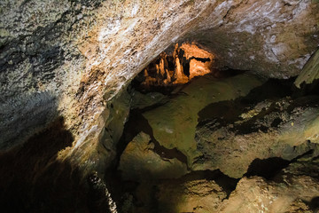 The beautiful stalactites and stalagmites and other rock formations are reflected in a small lake in the Antro del Monte Corchia cave in the Apuan Alps in Italy.