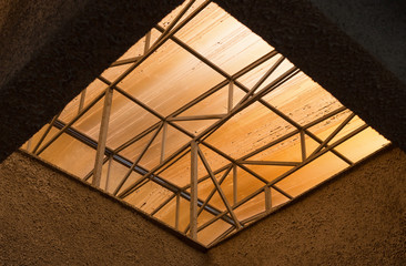 sunlight penetrates the building through the glass ceiling