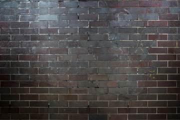 Brown brick wall. Texture grunge background.