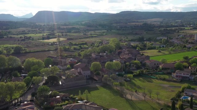 Beautiful sunset over Campagne village vineyards agricultural lands pic saint loup occitanie France