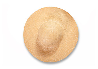 Pretty straw hat with ribbon and bow on white background. Beach hat top view isolated