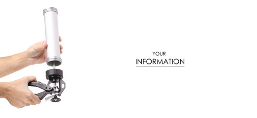 Silicone gun equipment in hand pattern on white background isolation